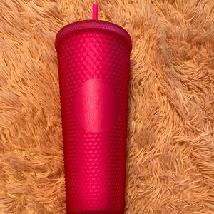 Hot pink Starbucks cup